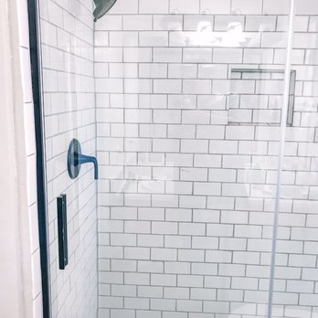 Honey Do - a shower with a glass door - Landscaping Near Me