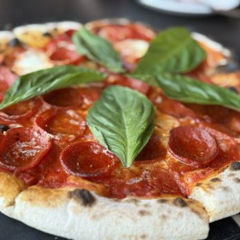New Haven Pizza - Margherita with Red sauce, fresh mozzarella, fresh basil and we added pepperoni. - Pizza Near Me - Knoxville, Tennessee New Haven Pizza - Margherita with Red sauce, fresh mozzarella, fresh basil and we added pepperoni. - Pizza Near Me - Knoxville, Tennessee