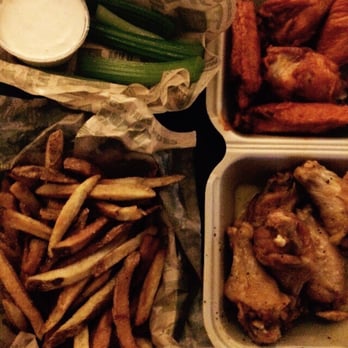 Wingstop - Original hot is lacking sauce but the lemon pepper looks great. Fries are perfect. - Chicken Wings Near Me - Forth Worth, Texas