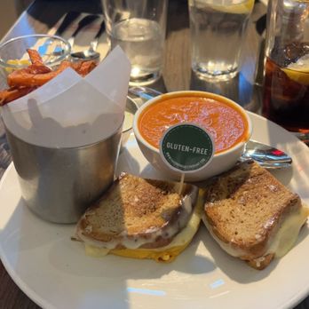 Friedman's - Gluten Free Grilled Cheese with Tomato Soup and substituted the chips for Sweet Potato Fries! - Breakfast & Brunch Near Me - New York, New York Friedman's - Gluten Free Grilled Cheese with Tomato Soup and substituted the chips for Sweet Potato Fries! - Breakfast & Brunch Near Me - New York, New York