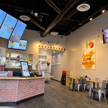 Habibi Grill - a woman standing at the counter - Halal Near Me - La Mirada, California Habibi Grill - a woman standing at the counter - Halal Near Me - La Mirada, California