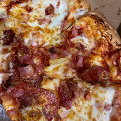 Stoner's Pizza Joint - Really Big Nice to Meat Pizza  So my meat lovers pizza has pineapple?