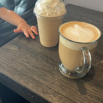 Crux Coffee Roasters - Our drinks with a side of my son's hand trying to grab the drinks lol - Coffee Roasteries Near Me - Jupiter, Florida Crux Coffee Roasters - Our drinks with a side of my son's hand trying to grab the drinks lol - Coffee Roasteries Near Me - Jupiter, Florida