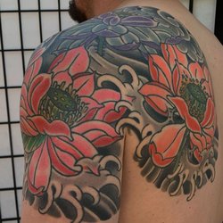 Lone Star Tattoo - Healed 2+ years, Irezumi Lotus tattoo by @scottcookseytattooer Bold will hold!