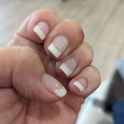 Happy Nails - Kim did my pink and white dip.