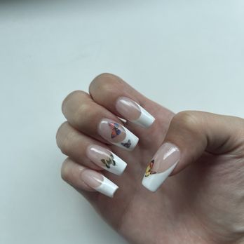 Natural Nail & Spa - Gel X French Tips with Butterfly stickers - Nail Salons Near Me - Los Angeles, California Natural Nail & Spa - Gel X French Tips with Butterfly stickers - Nail Salons Near Me - Los Angeles, California