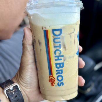 Dutch Bros Coffee - Iced coconut cream latte with coconut soft top, it was yummy and refreshing, but lacked coconut flavor - Juice Bars & Smoothies Near Me - Murrieta, California