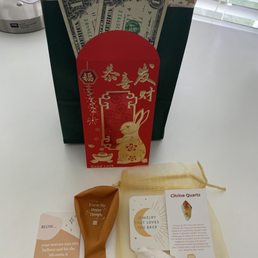 Extra goodies w/ my purchase including a red envelope for the Lunar New Year :) I had such a unique and thoughtful experience here. Extra goodies w/ my purchase including a red envelope for the Lunar New Year :) I had such a unique and thoughtful experience here.
