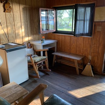 Fireside Inn - Front room of the cabin. Faces the lake. Good fridge and an old school broom. - Hotels Near Me - Presque Isle, Michigan Fireside Inn - Front room of the cabin. Faces the lake. Good fridge and an old school broom. - Hotels Near Me - Presque Isle, Michigan