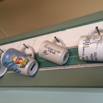 Mel's Diner - Coffee mugs lining wall - Diners Near Me - Phoenix, Arizona Mel's Diner - Coffee mugs lining wall - Diners Near Me - Phoenix, Arizona