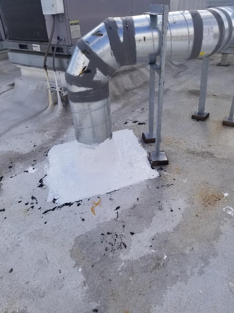 Slide of Huncho Roofer