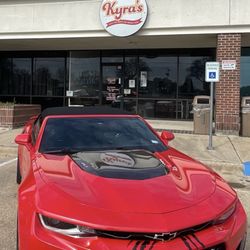 Kyra’s Mesquite Chicken Fish and More - Parking lot storefront