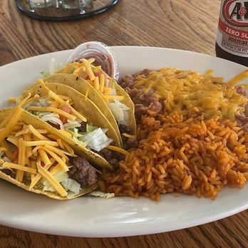 Piccadilly Circus Pizza - Taco plate with three ground beef tacos, rice and beans. - Pizza Near Me - San Luis, Colorado Piccadilly Circus Pizza - Taco plate with three ground beef tacos, rice and beans. - Pizza Near Me - San Luis, Colorado