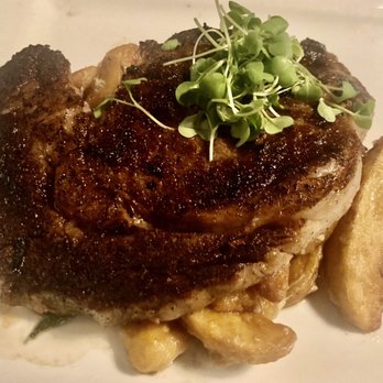 Ricos World Kitchen - Ribeye special. Underneath were potato wedges, cheese curds, green beans and crabmeat. $31. - New American Near Me - Buford, Georgia Ricos World Kitchen - Ribeye special. Underneath were potato wedges, cheese curds, green beans and crabmeat. $31. - New American Near Me - Buford, Georgia