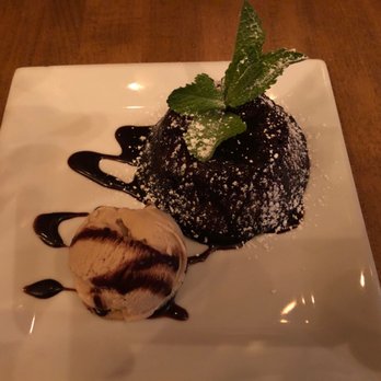 Lido - Molten chocolate cake with coffee ice cream. - Italian Near Me - New York, New York Lido - Molten chocolate cake with coffee ice cream. - Italian Near Me - New York, New York