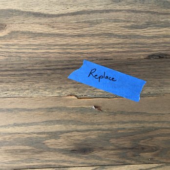 Boardwalk Floors - Another of several areas marked for repair after we were told, for the 2nd time,  the job was done - Flooring Near Me - Milford, Michigan