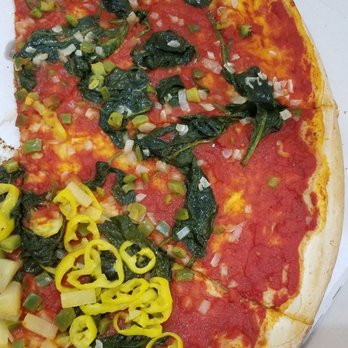 Wegmans - Poorly made pizza with way too much spinach & not enough onion & green peppers. And the spinach tastes & smells like dirt! Disgusting! - Grocery Near Me - Frederick, Maryland