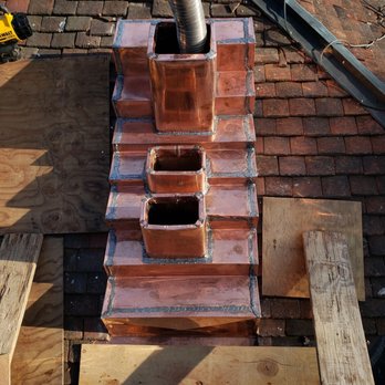 Triple A Home Improvement - a brick chimney being installed - Roofing Near Me - Norwalk, Connecticut Triple A Home Improvement - a brick chimney being installed - Roofing Near Me - Norwalk, Connecticut