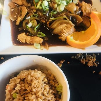 Kue's Cafe - Egg foo young with a side of fried rice which is included . You can choose fried or white Rican - Chinese Near Me - Dunedin, Florida