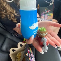 McDonald's - As you can see there is no sauce and got milk instead of juice. Also this toy is useless. I will be calling the manager.