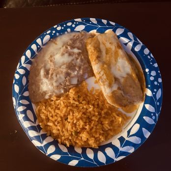 El Jalisco - Tamale with beans and rice.... I got a dinner that had two tamales in it, but this is only one of them. - Mexican Near Me - McDonough, Georgia