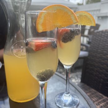 Upper Kirby Bistro - Peach Essence Mimosa Carafe - New American Near Me - Houston, Texas