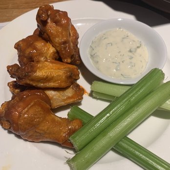 Earls Kitchen + Bar - This is the Earl's kitchen chicken which is an appetizer for 6 wings for $17. I'm not impressed nor amused. What is worth $17 here? - New American Near Me - Somerville, Massachusetts