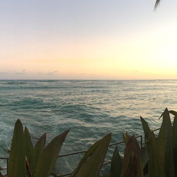 RumFire - Sunset view from walkway by water, in front of a seating area - Asian Fusion Near Me - Honolulu, Hawaii RumFire - Sunset view from walkway by water, in front of a seating area - Asian Fusion Near Me - Honolulu, Hawaii