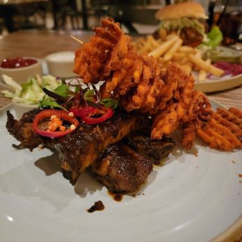 Yardbird - RIBS SPECIAL (front) Fried Chicken Burger (back) - Southern Near Me - Las Vegas, Nevada Yardbird - RIBS SPECIAL (front) Fried Chicken Burger (back) - Southern Near Me - Las Vegas, Nevada