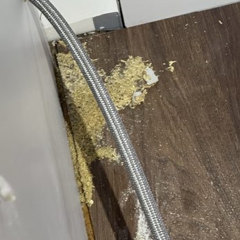 Schumacher Homes - Raleigh-Durham - This is the edge of the floor under where the dishwasher sits and there's so sealant or anything, just a small gap revealing the subfloor - General Contractors Near Me - Benson, North Carolina Schumacher Homes - Raleigh-Durham - This is the edge of the floor under where the dishwasher sits and there's so sealant or anything, just a small gap revealing the subfloor - General Contractors Near Me - Benson, North Carolina