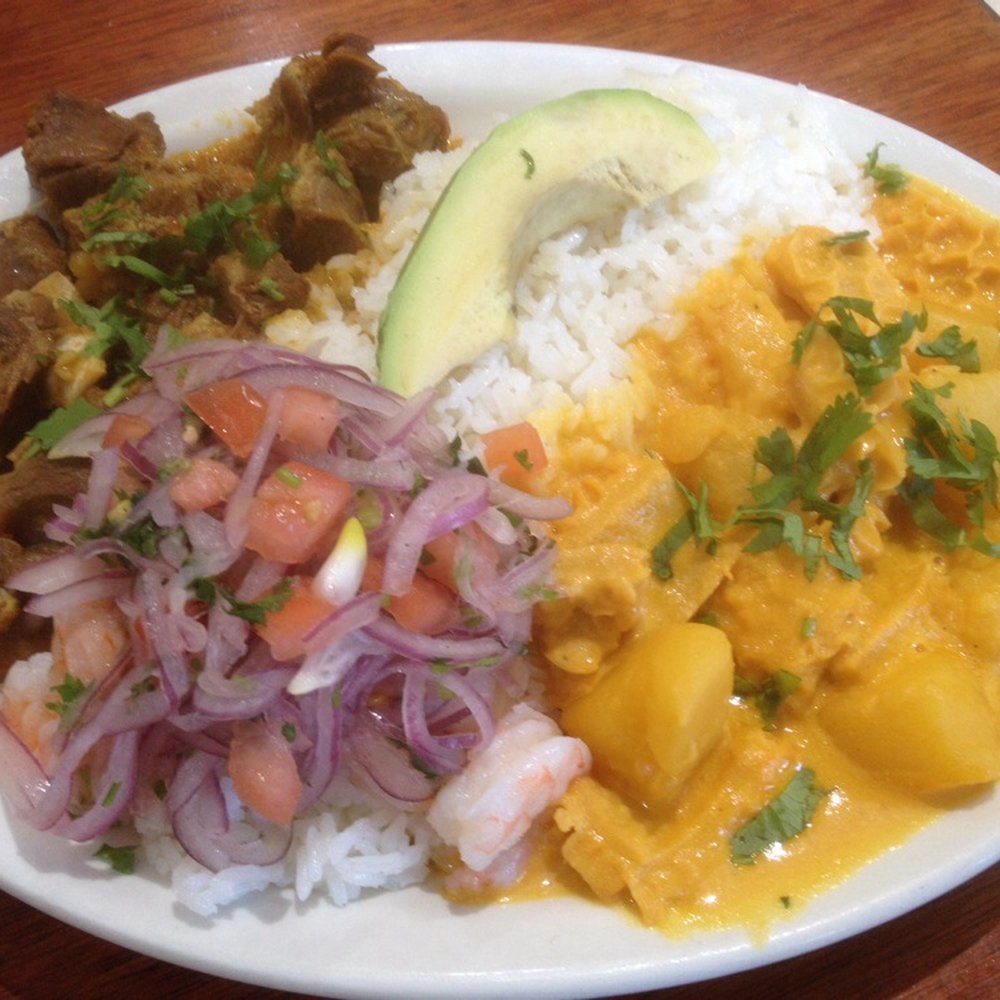 Ecuadorian style goat, shrimp , and tripe wih potatoes and rice