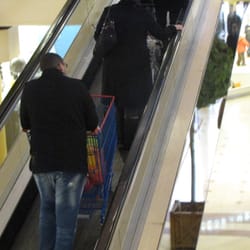 Belle Épine - A shopping cart on an escalator