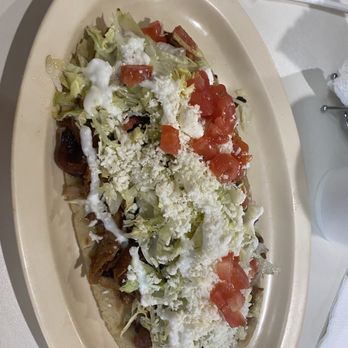 Taqueria Mi Pueblo - a plate of food on a table - Mexican Near Me - Chicago, Illinois Taqueria Mi Pueblo - a plate of food on a table - Mexican Near Me - Chicago, Illinois