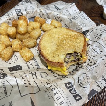 Wayback Burgers - Cheesy burger and undercooked tots - Burgers Near Me - San Antonio, Texas