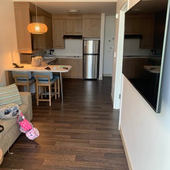 Element Santa Clara - View of full kitchen and living room from the entrance to the balcony - Hotels Near Me - Santa Clara, California Element Santa Clara - View of full kitchen and living room from the entrance to the balcony - Hotels Near Me - Santa Clara, California