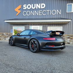 Sound Connection - Porsche in front of our Waite Park shop after an audio install.