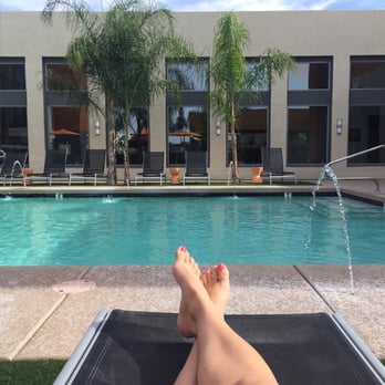 Seven Luxury Apartments - Relaxing at the pool. - Apartments Near Me - Phoenix, Arizona Seven Luxury Apartments - Relaxing at the pool. - Apartments Near Me - Phoenix, Arizona