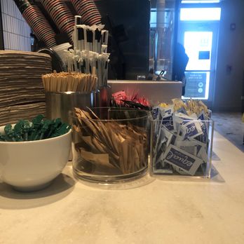 Starbucks - a counter with a bowl of coffee and a bowl of strawberries - Coffee & Tea Near Me - Chicago, Illinois