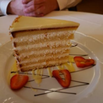Peninsula Grill - Famous coconut cake - New American Near Me - Charleston, South Carolina