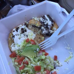 Burritas- (not a burrito) deep fried cornmeal bread. Filled w/black beans, sour cream + cheese. Delicious Burritas- (not a burrito) deep fried cornmeal bread. Filled w/black beans, sour cream + cheese. Delicious