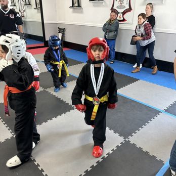 United Kenpo Karate Studios - my son with the medal he just won - Karate Near Me - Garden Grove, California United Kenpo Karate Studios - my son with the medal he just won - Karate Near Me - Garden Grove, California