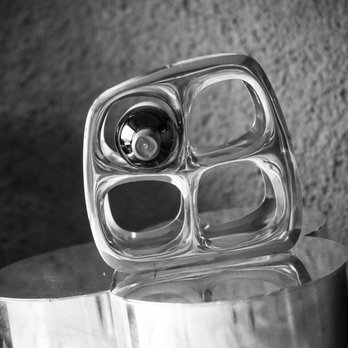 Covert Estate - a close up of a silver plated object - Wineries Near Me - Napa, California