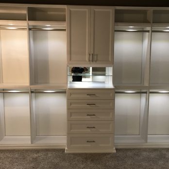 Lake Custom Closets - Walk-in with Hutch, decorative molding and custom lighting. - Home Organization Near Me - Chapel Hill, North Carolina Lake Custom Closets - Walk-in with Hutch, decorative molding and custom lighting. - Home Organization Near Me - Chapel Hill, North Carolina