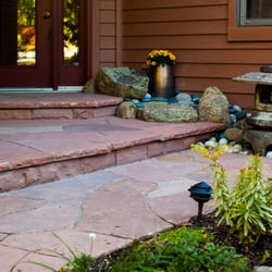 Emagine LLC - Custom Colorado red flagstone dry laid and mortared front entry and stair with dry stream bed and boulders