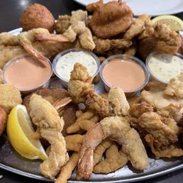Captain's Platter For 2. Includes 2 coleslaws plus 4 individual sides. Enough for 3 people, possibly 4.