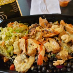 Global Cafe - Jerk Chicken & Jerk Shrimp Combo w/ rice, beans and cabbage. Tasted exactly how it looks: incredible.