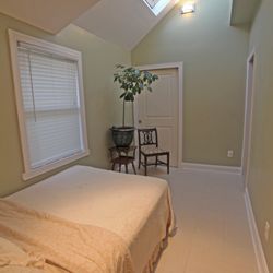 NJM Home Improvement - Renovated guestroom: work includes, drywall, lighting, skylights, pocket doors, door and window casing.