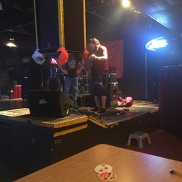 a band playing on stage a band playing on stage