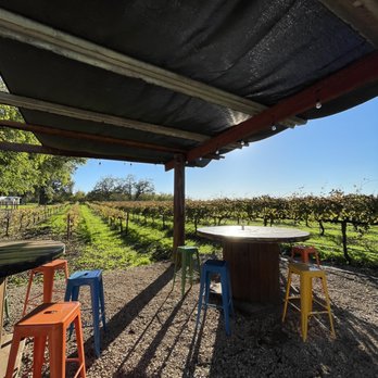 Nascere Vineyards - a patio with a table and chairs - Wineries Near Me - Chico, California