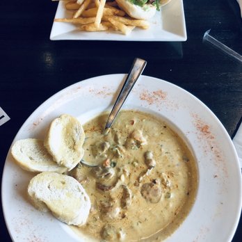 Stripers Waterside - Oyster andouille stew, oyster po boy - Seafood Near Me - Norfolk, Virginia Stripers Waterside - Oyster andouille stew, oyster po boy - Seafood Near Me - Norfolk, Virginia